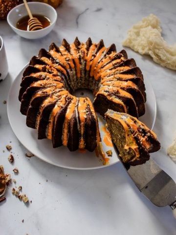 Pumpkin pecan bundt cake with brown butter maple glaze