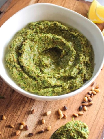 asparagus and basil made into a pesto in a small bowl.