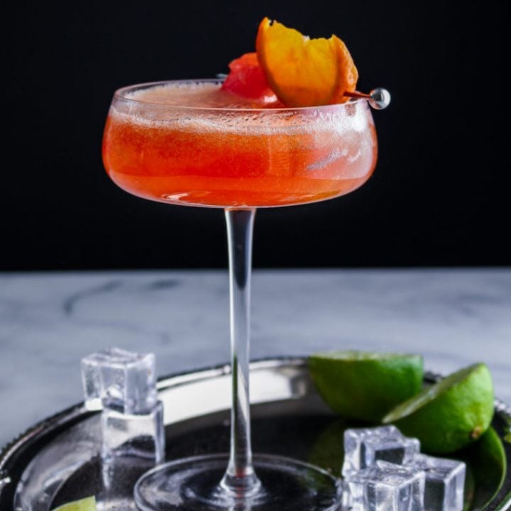 Papaya Mandarin rum cocktail Worldly Treat