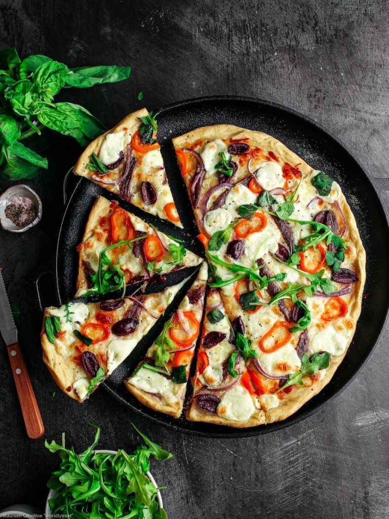 A slice of anchovy pizza