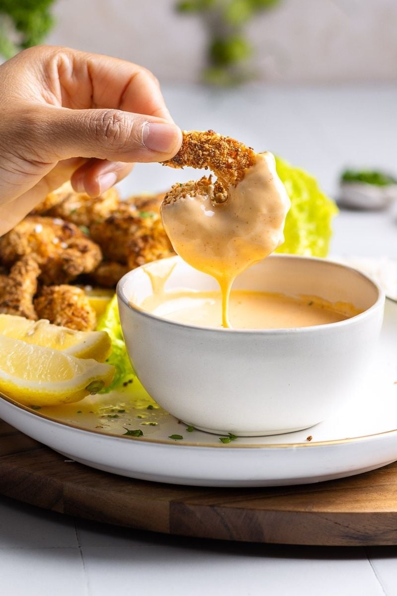 breaded shrimp dipped in sriracha dip