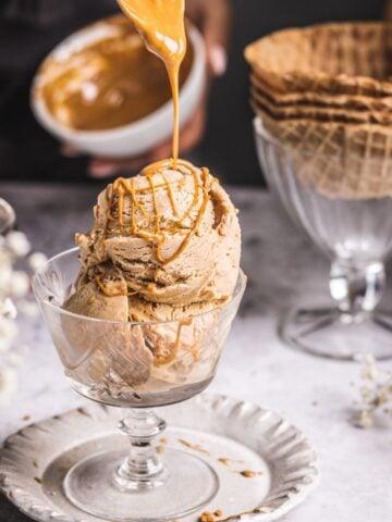 drizzling cookie butter over ice cream