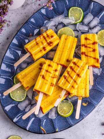 pineapple mango popsicles with tajin seasoning mix