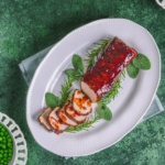 Air Fryer Pork Tenderloin with Cranberry bbq Sauce on a plate