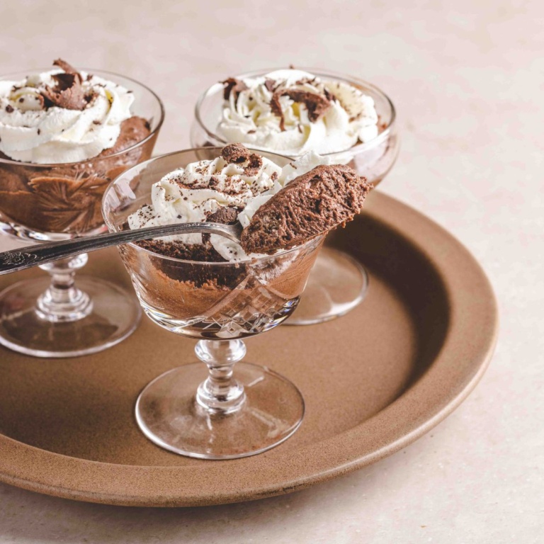A scoop of Mousse au chocolat in a cup.