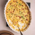 Cheesy Corn Casserole served in a casserole dish.