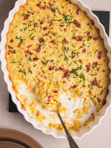 Cheesy Corn Casserole served in a casserole dish.