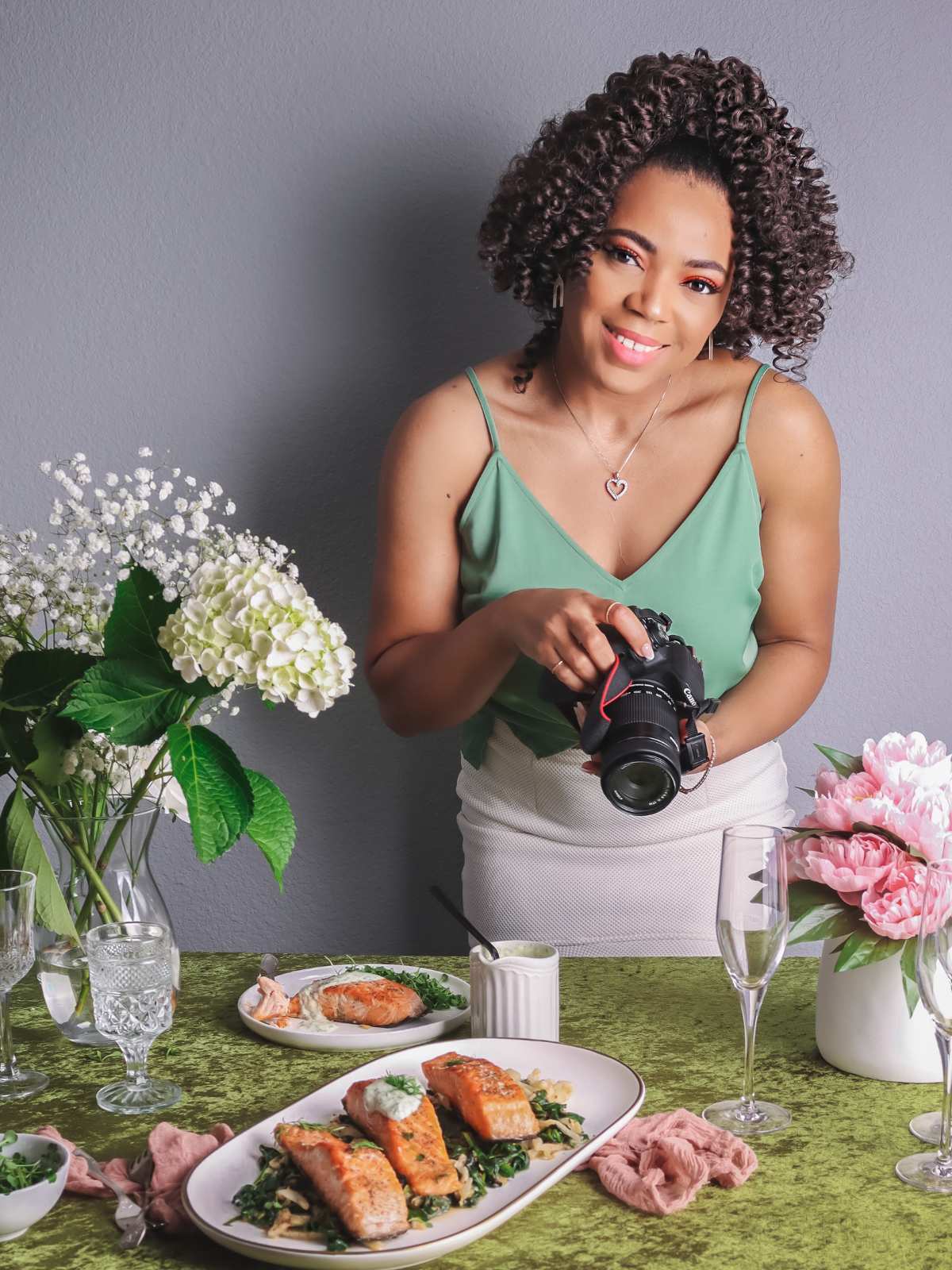 Maureen photographing food.