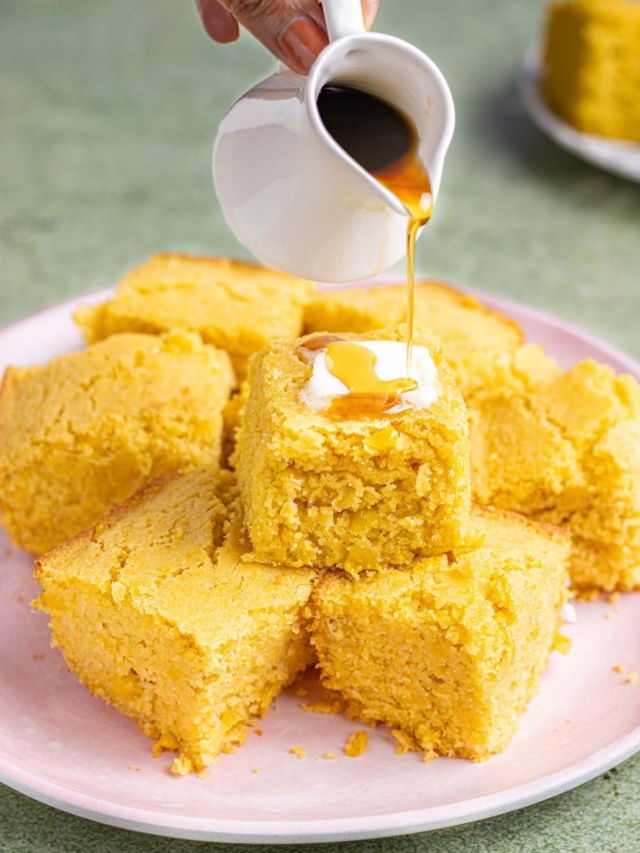 drizzling maple syrup over cornbread.