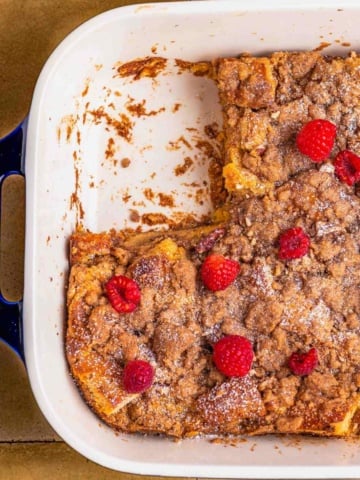 Raspberry and confectioner sugar topped over the casserole bake.
