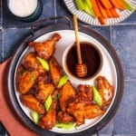 Hot honey chicken wings with hot honey sauce.