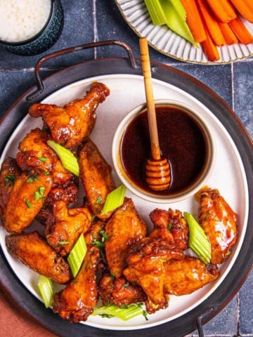 Hot honey chicken wings with hot honey sauce.