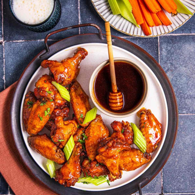 Hot honey chicken wings with hot honey sauce.