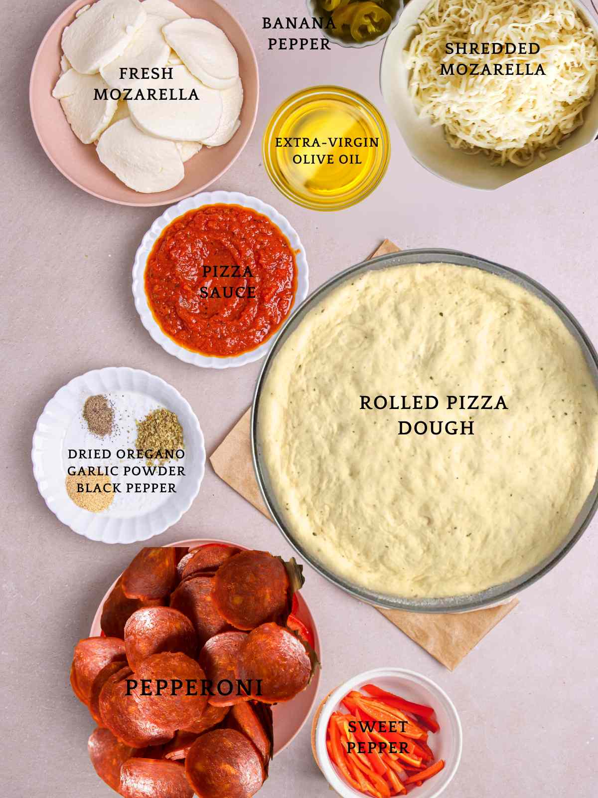 Ingredients needed to make pepperoni pizza at home.