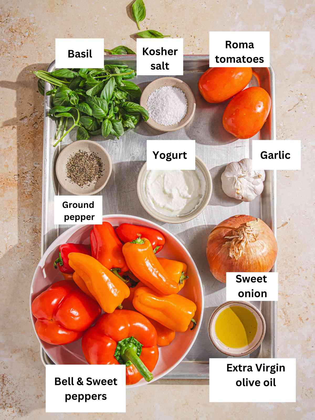 Ingredients for pepper sauce arranged on a baking pan.