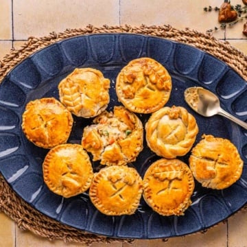 Chicken pot pie with cream of chicken soup in mini muffin tins.