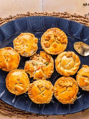 Chicken pot pie with cream of chicken soup in mini muffin tins.