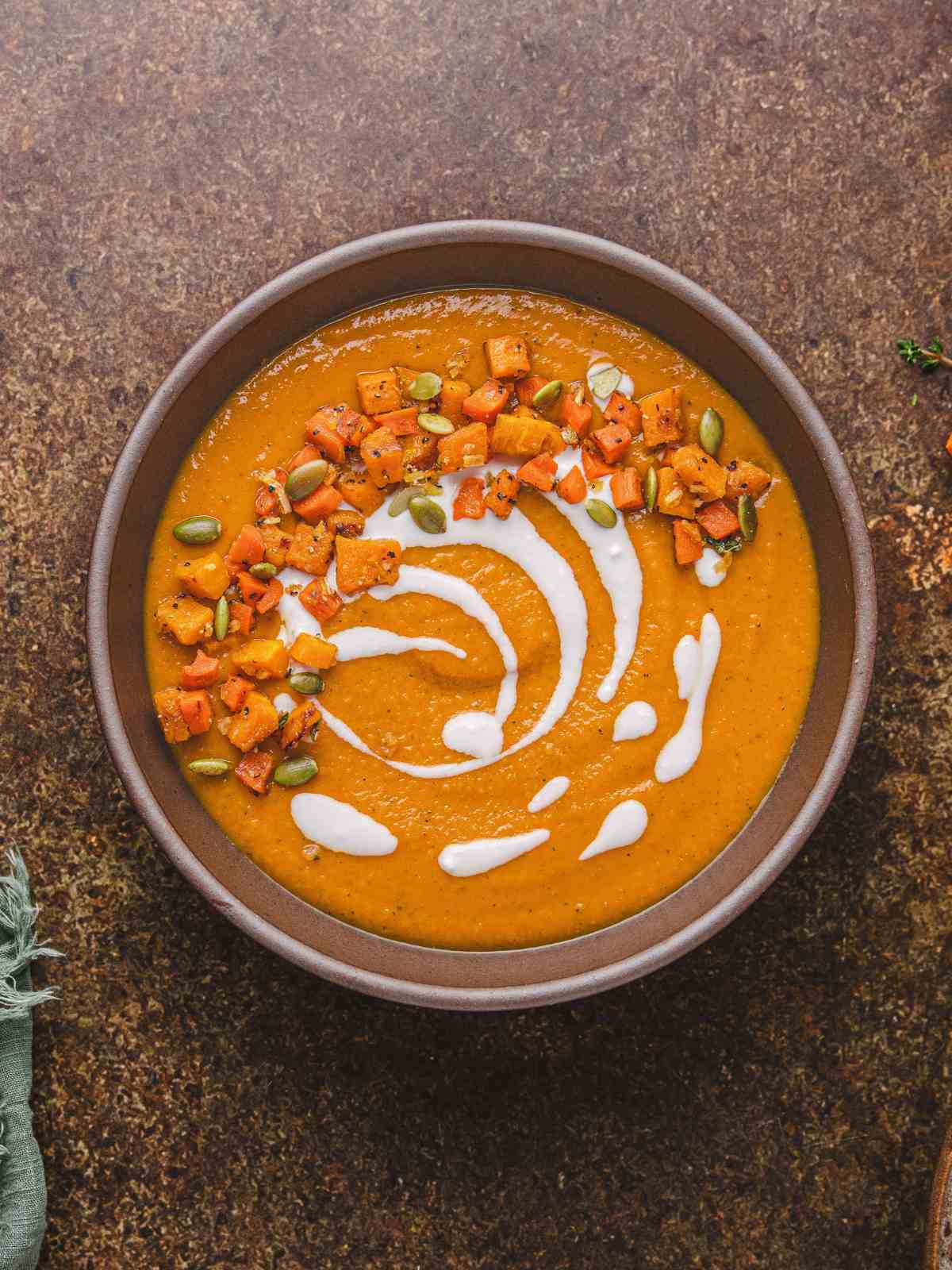 Butternut squash pureed with carrot in a bowl.