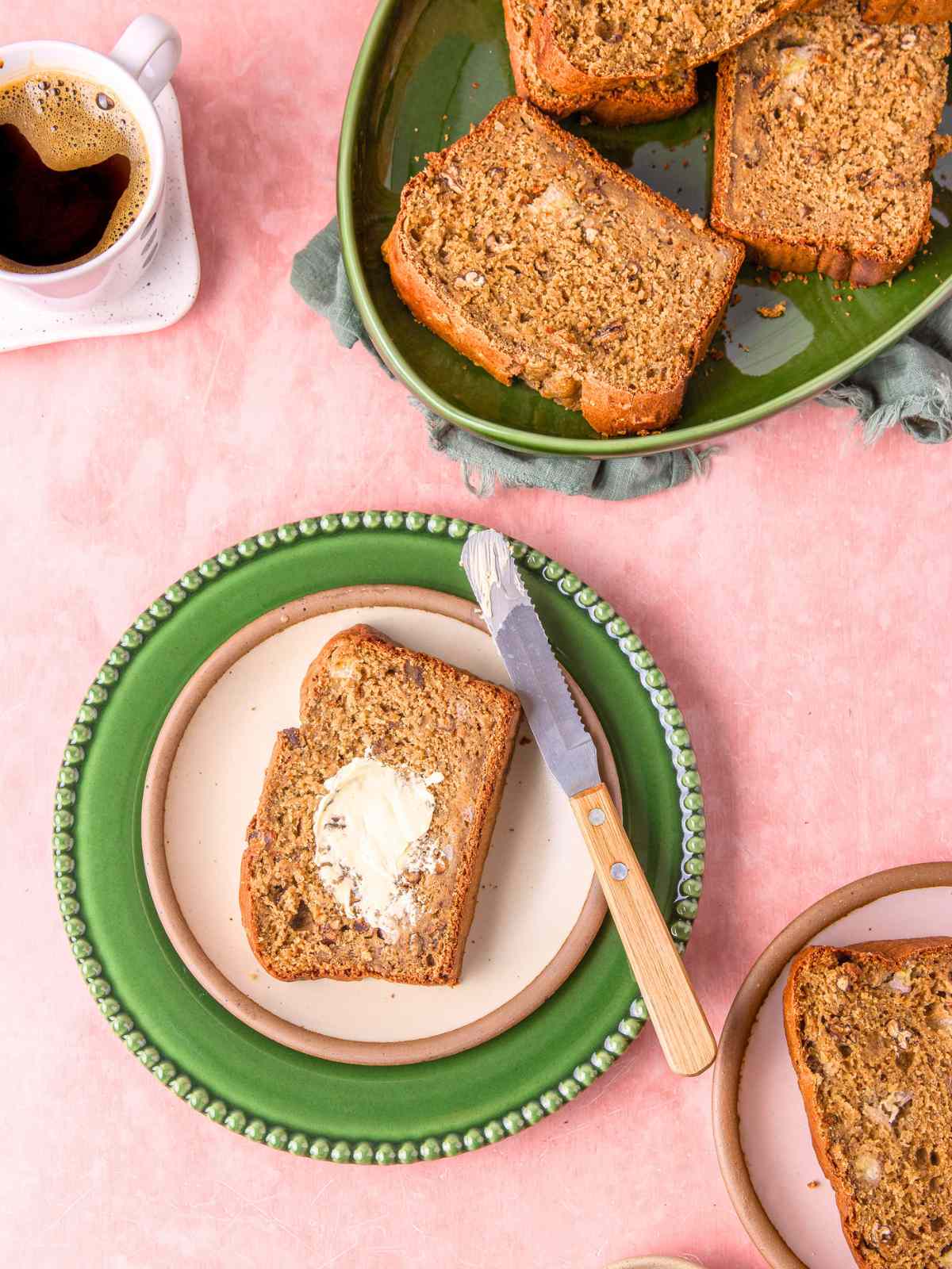 A slice of bread with a smear of butter.