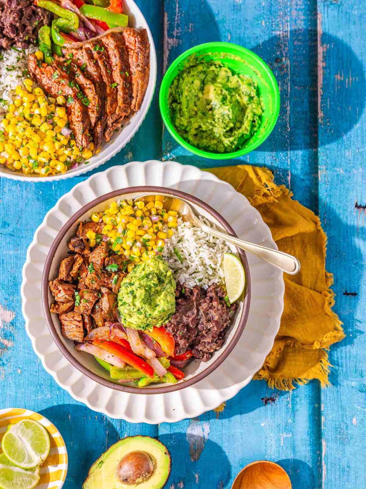 Burrito bowl with vegetables and guacamole.
