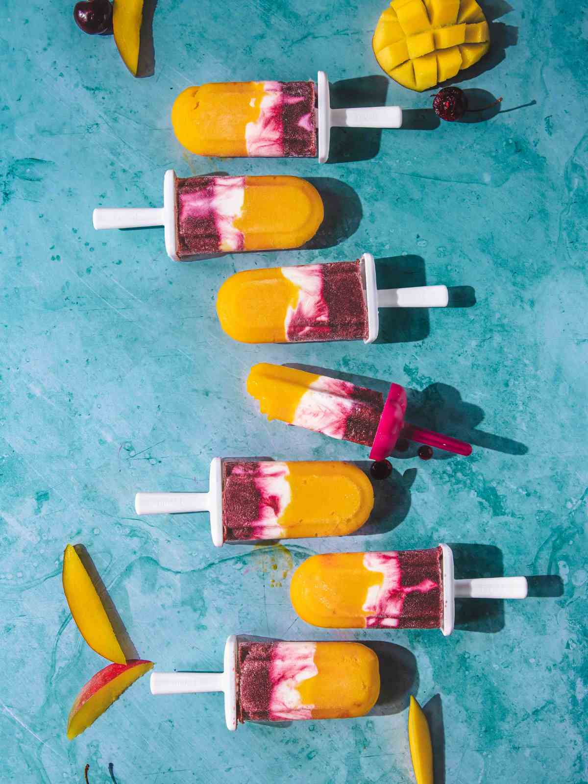 Cherry mango popsicles.