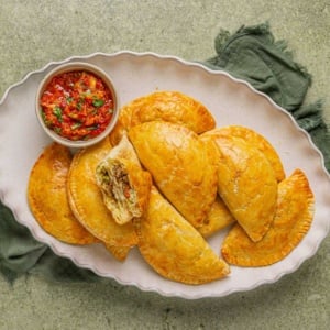Best Nigerian Meat Pie recipe with dipping sauce.