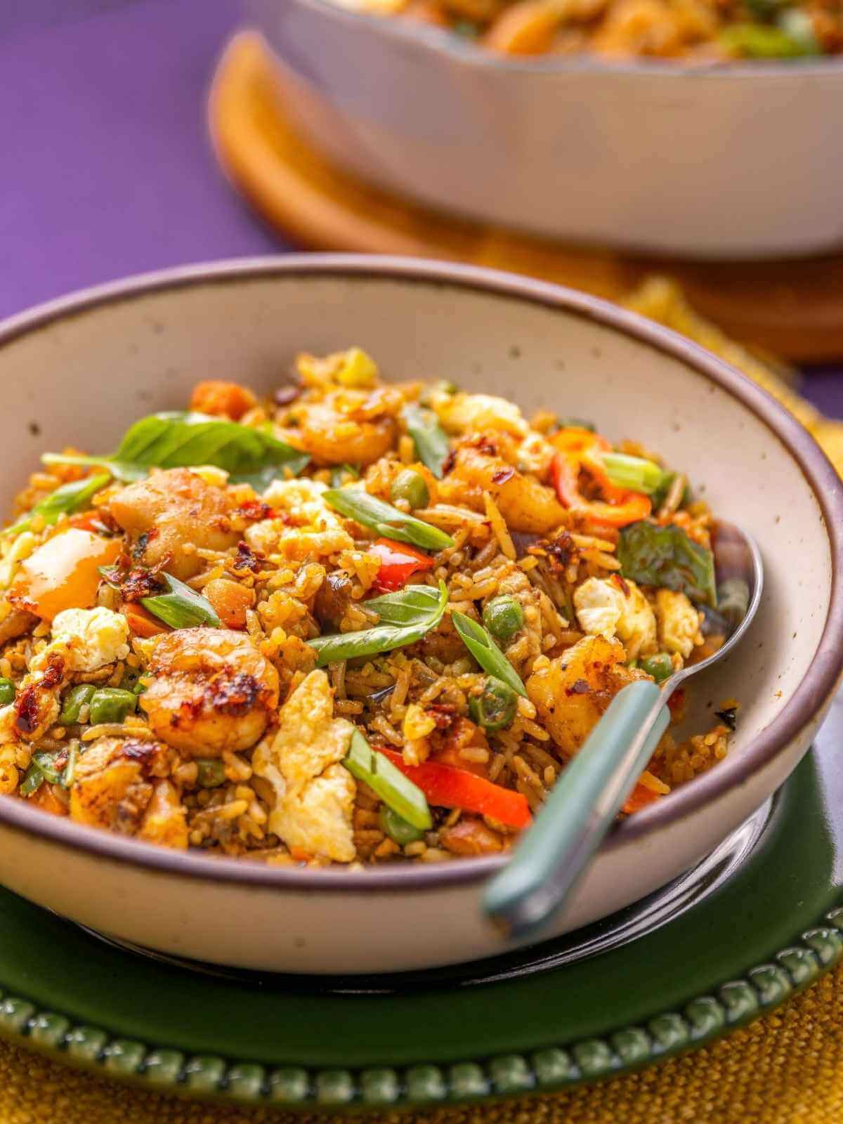 Rice with vegetables and eggs in a bowl.